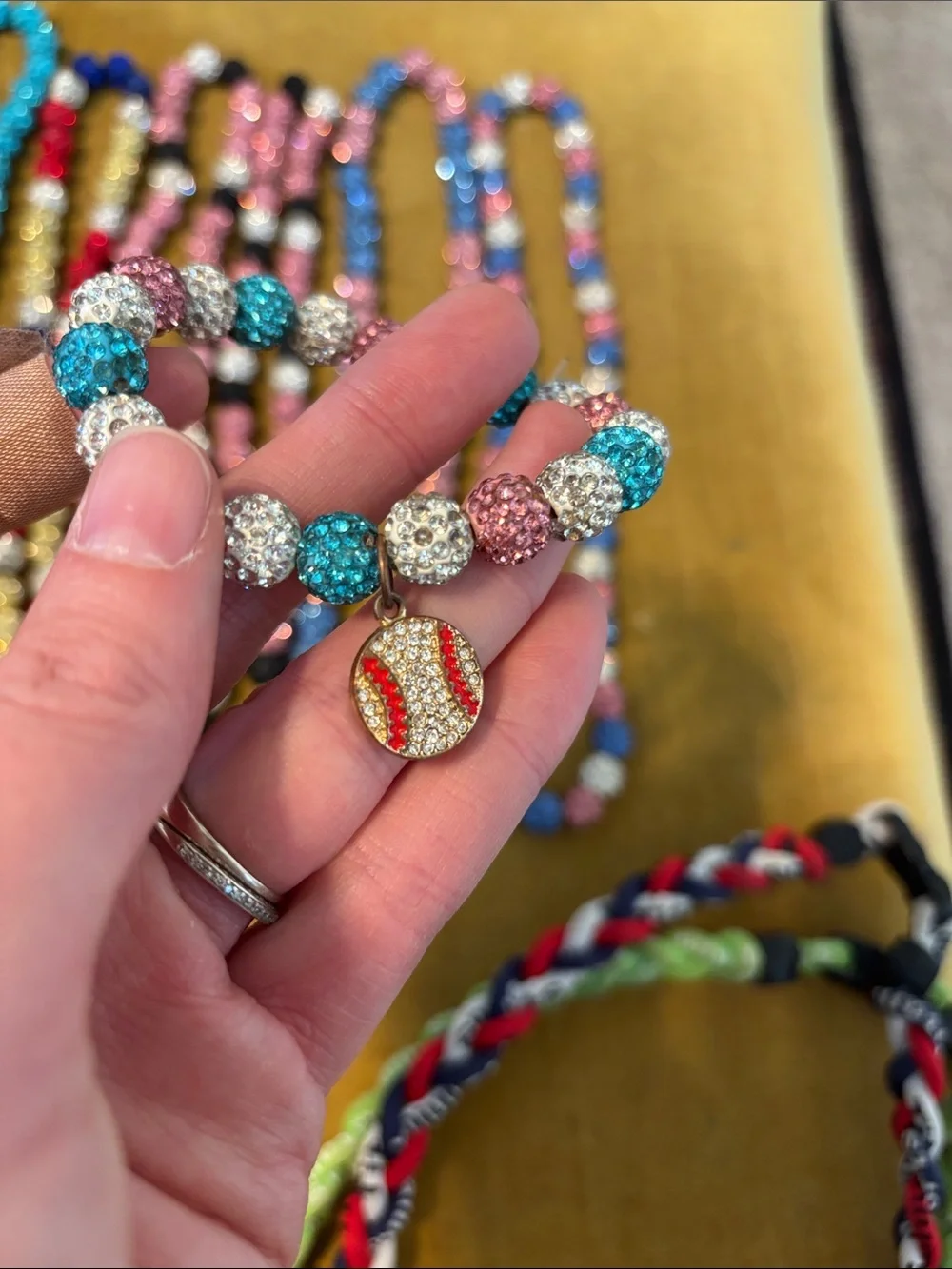Bundle of baseball necklaces and bracelet